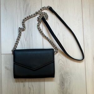 Sleek Black Crossbody Bag with Chain Strap